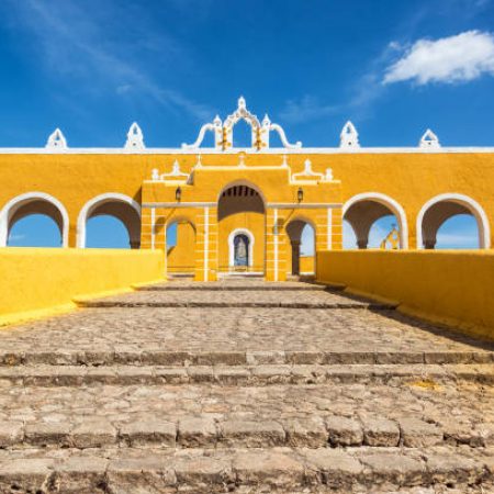 Path leading up to the entrance of the colonial monastery in Izamal, Mexico