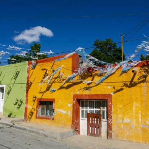 Parras de la Fuente, Mexico -- A view of a colorful street in the historic center of Parras de la Fuente, in the Coahuila state in northern Mexico. The city is famous for hosting the foundation of the first wine cellar on the American Continent and for being the birthplace of the revolutionary hero and messican President Francisco Ignacio Madero, assassinated on February 19, 1913.
