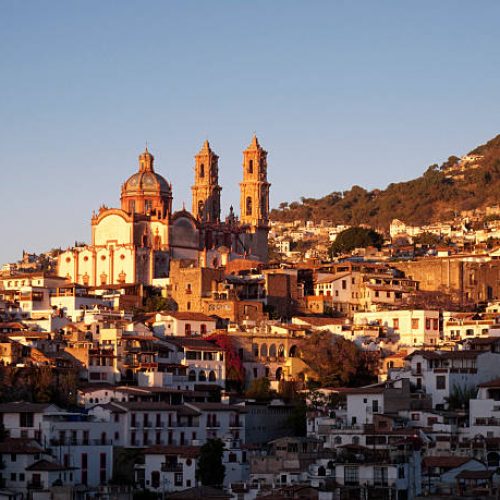 Sunrise over the famous baroque church of Santa Prisca in Taxco, Mexico. The colonial town of Taxco is a Unesco World Heritage site.